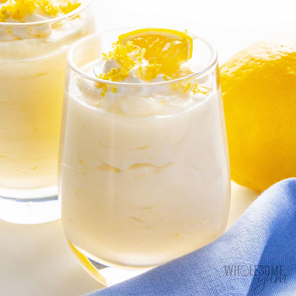 Lemon mousse recipe assembled in serving glasses.
