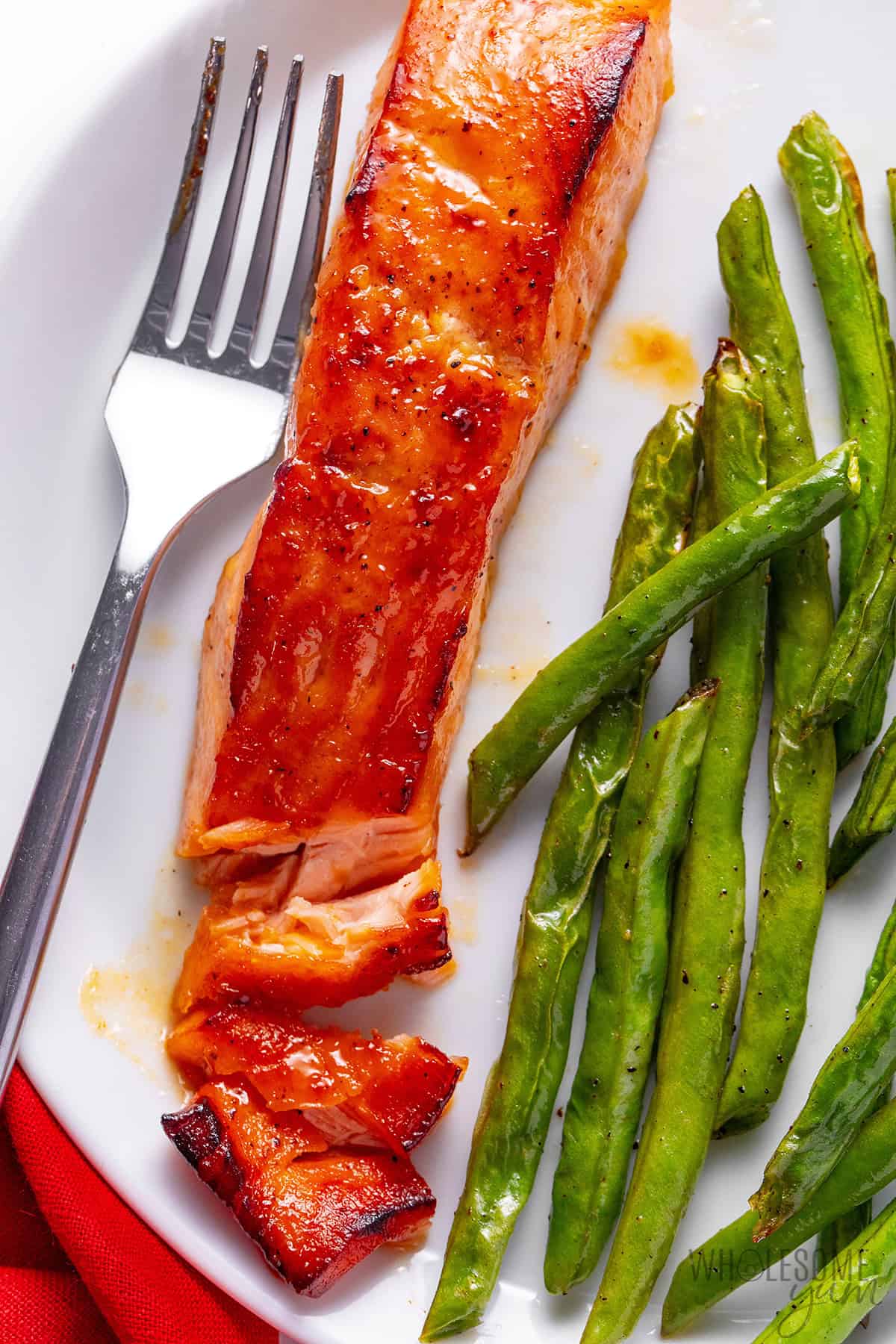 Maple glazed salmon served with green beans.