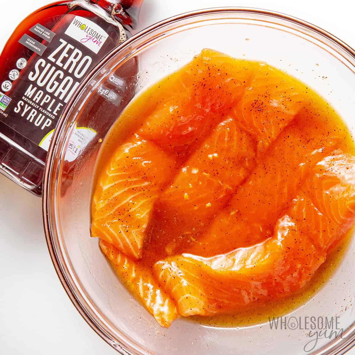 Marinating salmon in a bowl.
