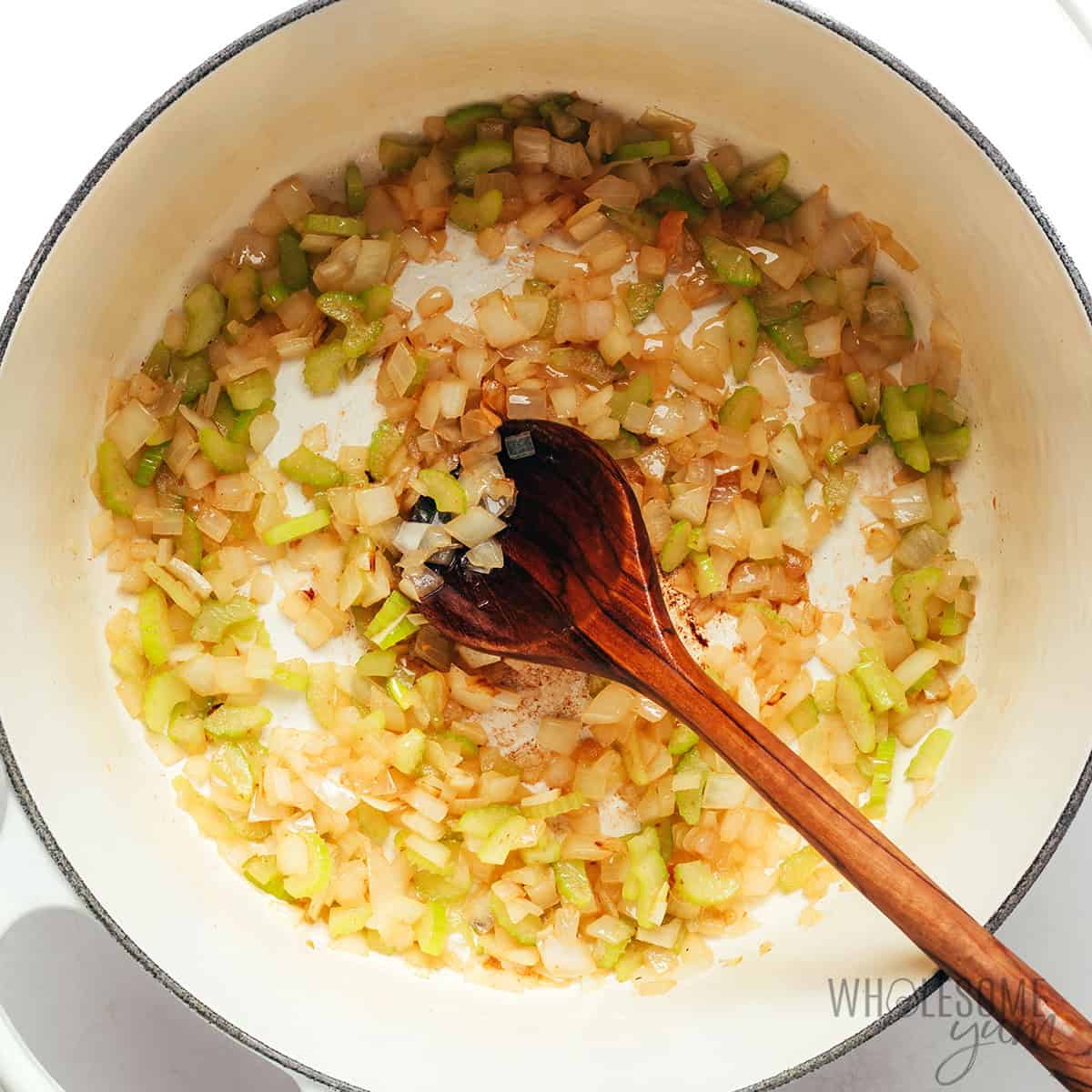 Sauteeing celery and onion in the Dutch oven.