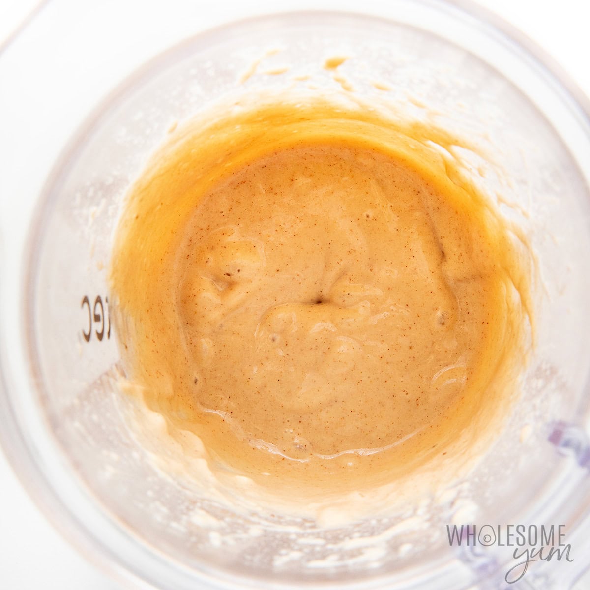 Blending banana mixture in a high-powered blender.