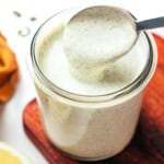 Greek yogurt ranch dressing and dip with a spoon.