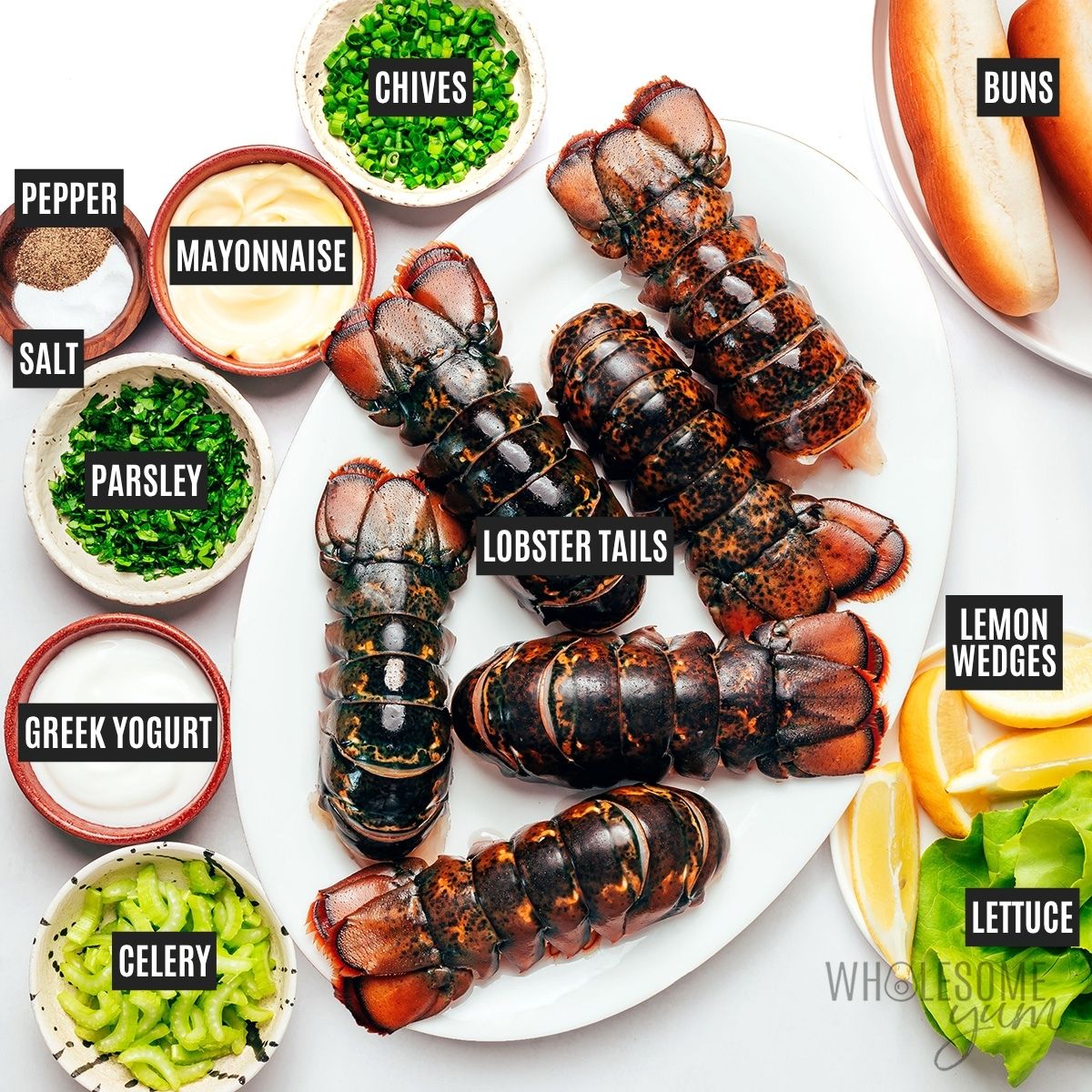 Maine lobster roll ingredients: Lobster tails, mayonnaise, Greek yogurt, celery, fresh herbs, salt, pepper, and ingredients for serving.