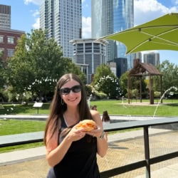 Maya enjoying a lobster roll in Boston.