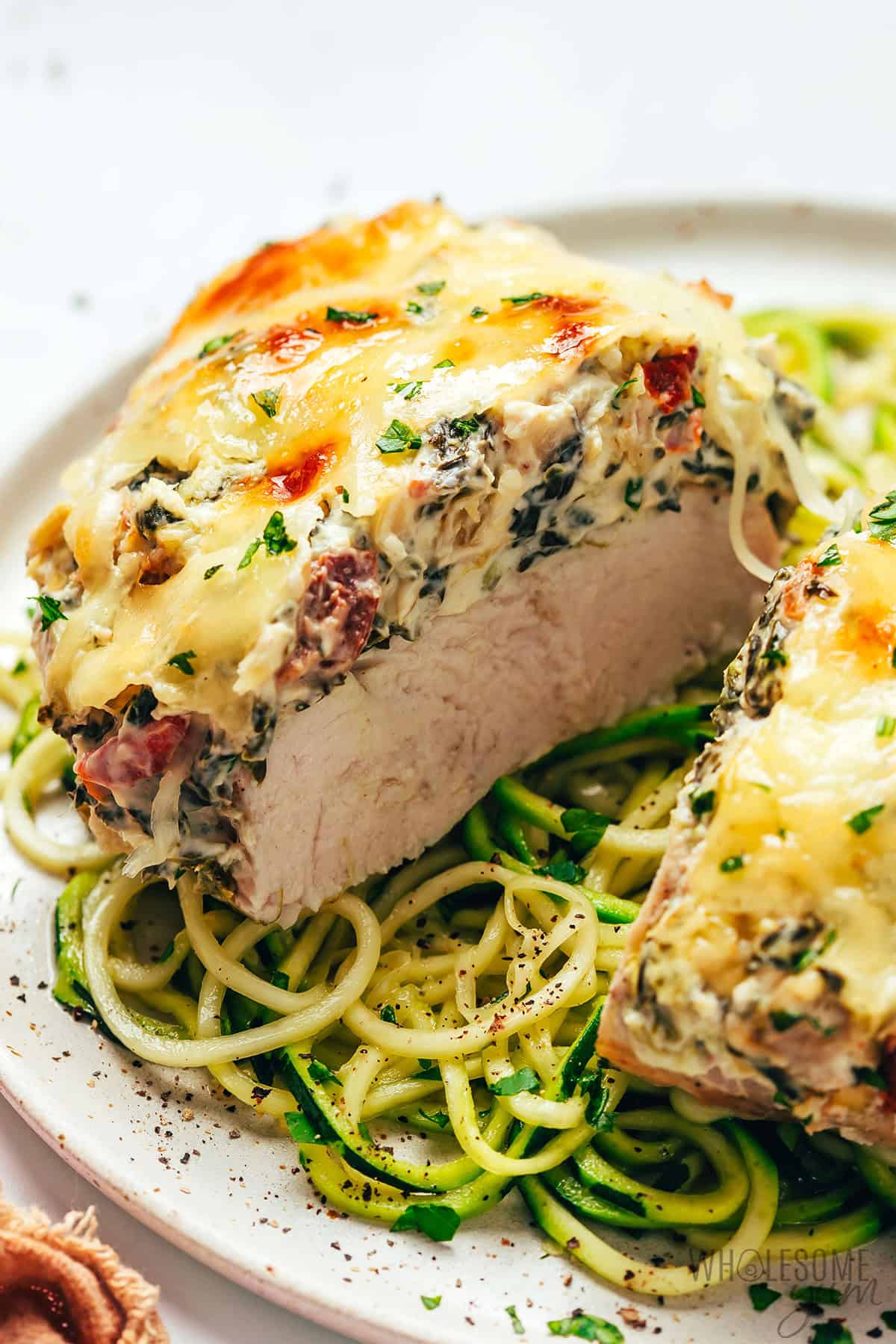Spinach artichoke chicken over zucchini noodles.