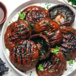 Grilled portobello mushrooms on a plate.