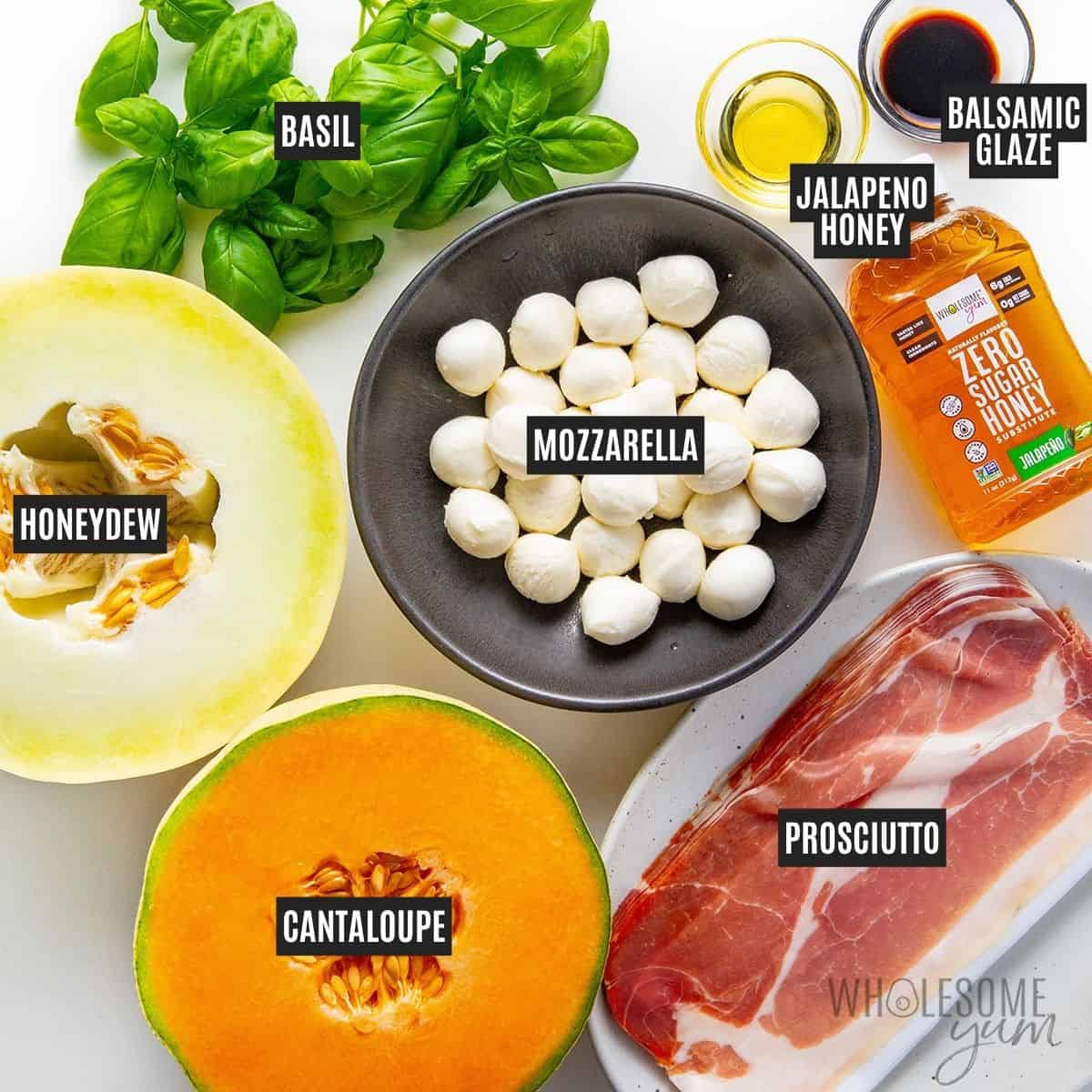 Labeled recipe ingredients: Cantaloupe, honeydew melon, prosciutto, fresh mozzarella, fresh basil, Wholesome Yum Zero Sugar Jalapeno Honey, and balsamic glaze.