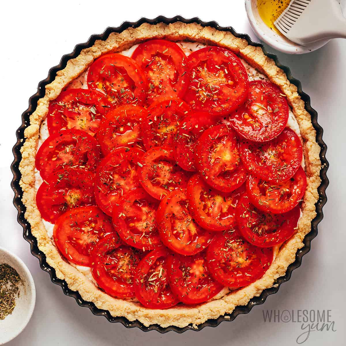 Tomato slices layered over the feta filling and topped with Italian seasoning.