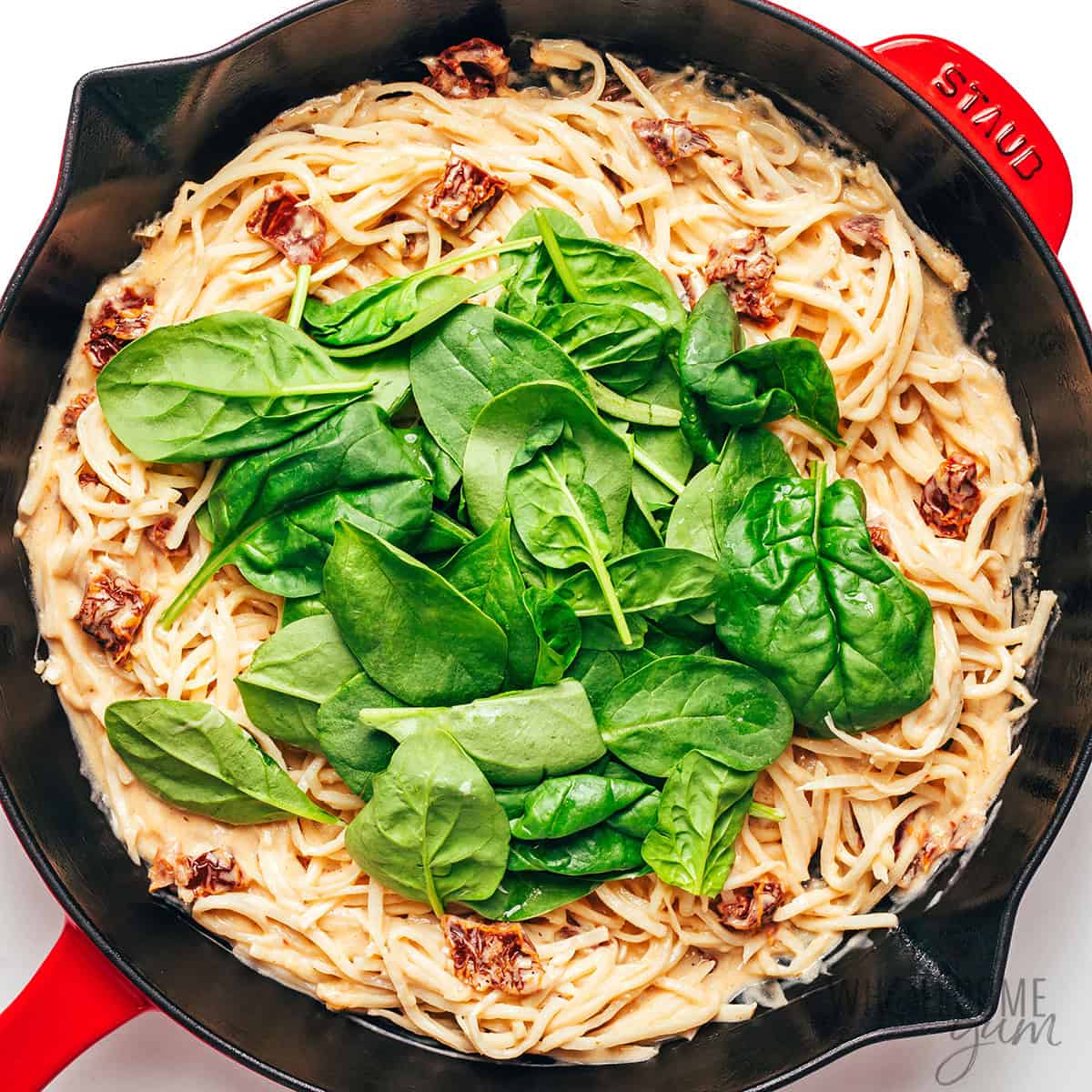 Baby spinach added to hearts of palm pasta.