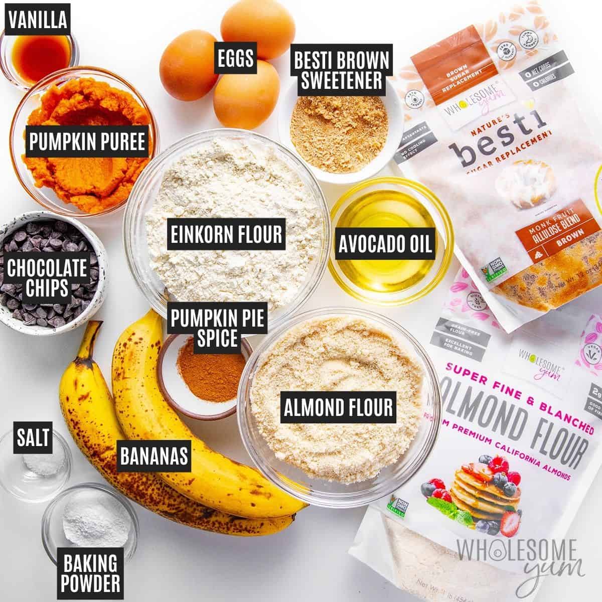 Labeled recipe ingredients: banana, einkorn flour, almond flour, pumpkin puree, eggs, chocolate chips, avocado oil, Besti Brown Monk Fruit Allulose Blend, vanilla extract, pumpkin pie spice, baking powder, and sea salt.