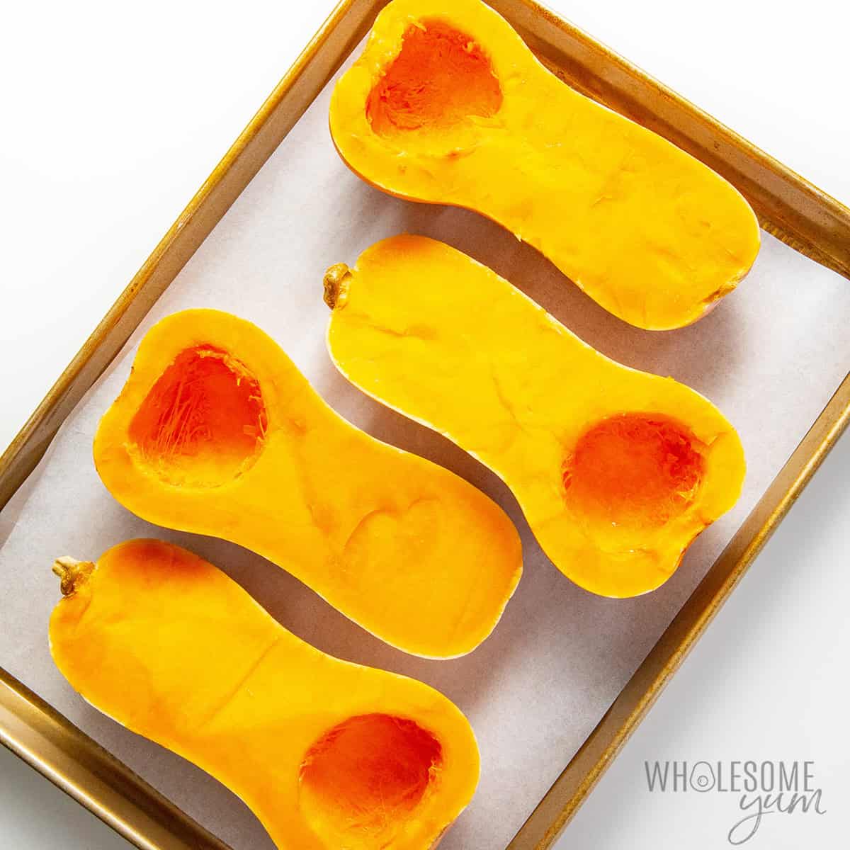 Butternut squash with seeds scooped out.