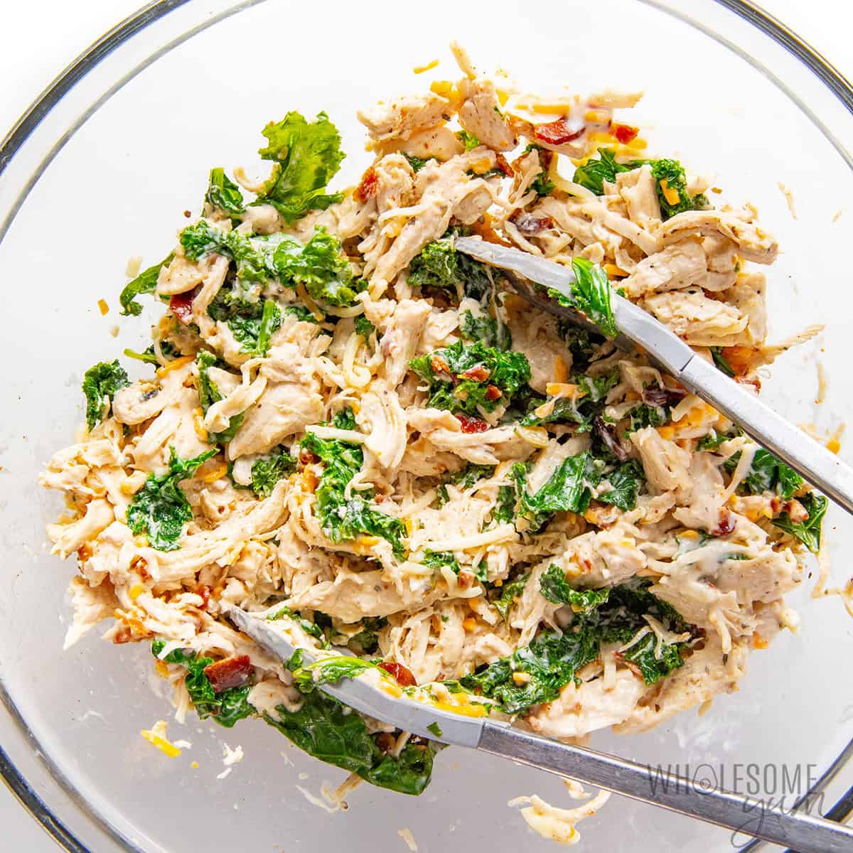 Chicken filling mixture in a bowl.