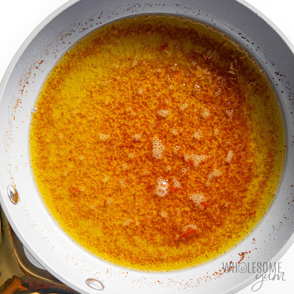 Melted butter in a skillet.